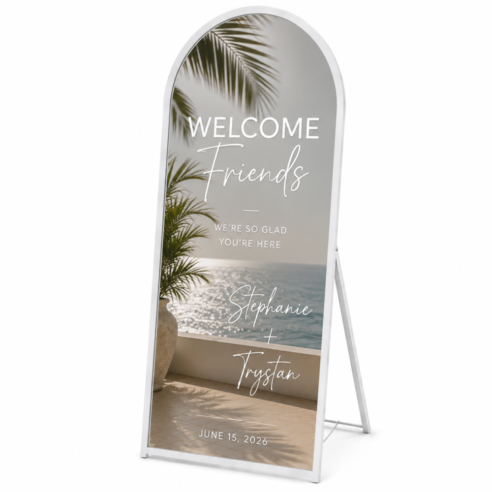 Personalized Selfie Mirror Welcome Sign featuring a white-framed full-length mirror with custom wedding lettering on a white background.